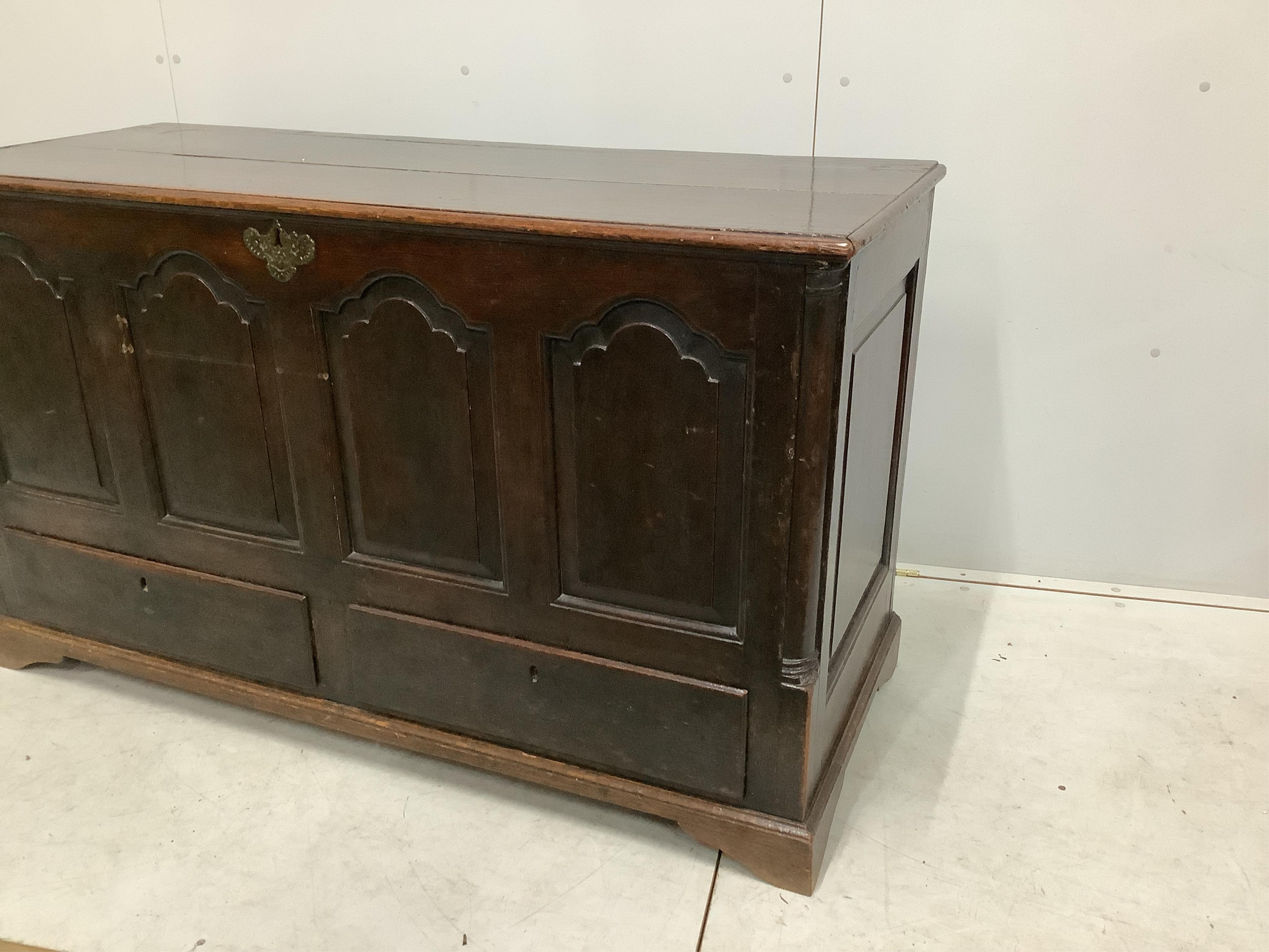 A late 17th / early 18th century panelled oak mule chest, width 141cm, depth 58cm, height 81cm. Condition - fair